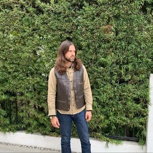 Men’s vintage brown leather vest.